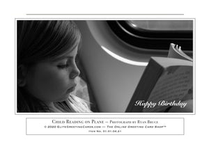 01.01.04.21—Child Reading on Plane