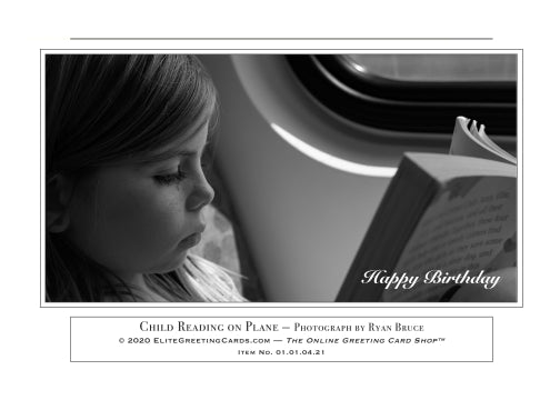 01.01.04.21—Child Reading on Plane